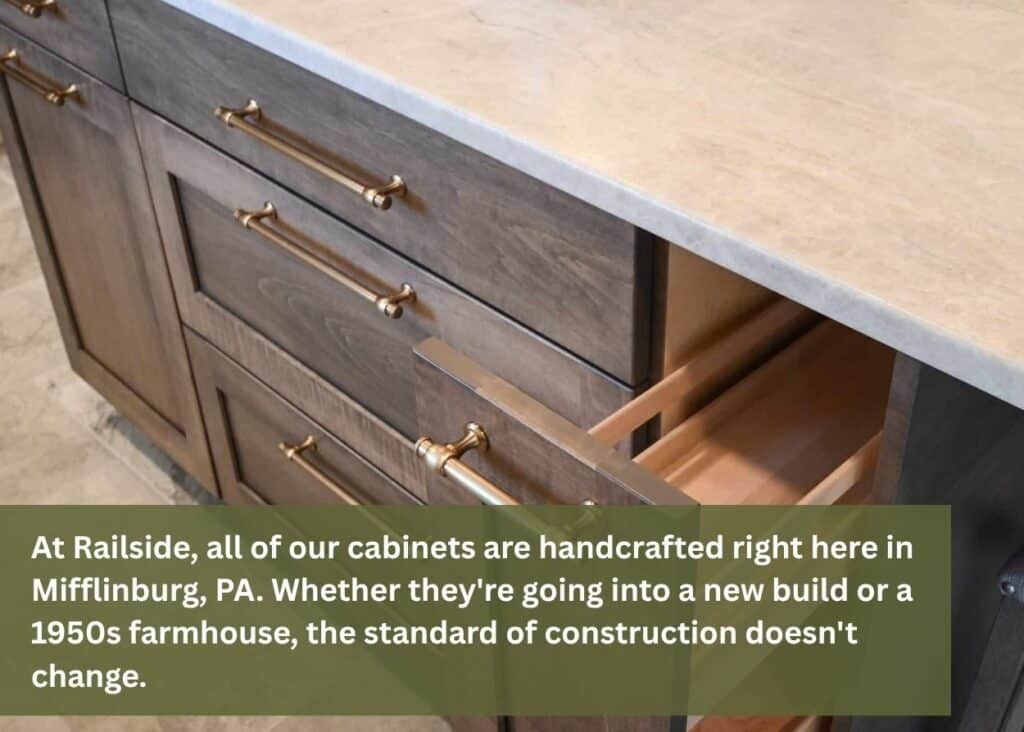 Handcrafted custom kitchen cabinets with deep pull-out drawers and soft-close storage by Railside Furnishings