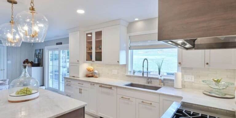 Explore five popular wood options for custom kitchen cabinets and learn how grain, color, character, and stain can help you choose the right fit.